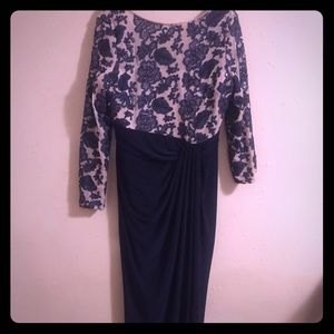 Long navy blue dress bottom and cream top with.